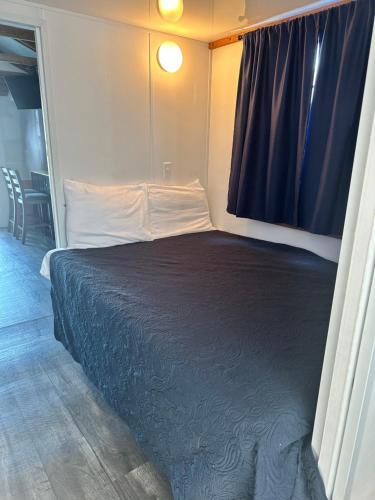 a bedroom with a large bed in a room at Aqua Lodges At Hurricane Hole Marina in Key West