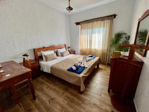 Postel nebo postele na pokoji v ubytování Villa Kore Elafonissi