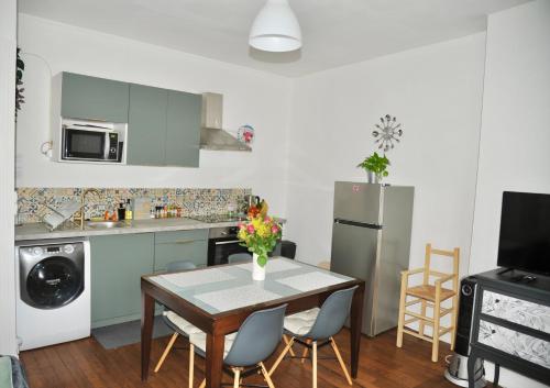 Kuchyň nebo kuchyňský kout v ubytování *Cocooning Family*