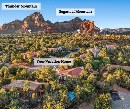 an aerial view of a home with mountains in the background at Large Spanish Villa -Hot tub- Pool -Gym- Game Room in Sedona