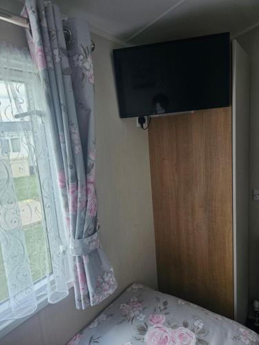 Μια τηλεόραση ή/και κέντρο ψυχαγωγίας στο Private Caravan Camber Sands