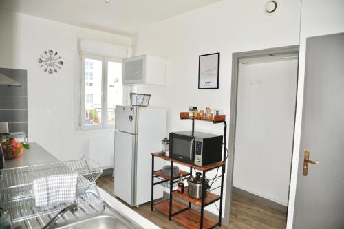 Η κουζίνα ή μικρή κουζίνα στο Ne restez pas à quai