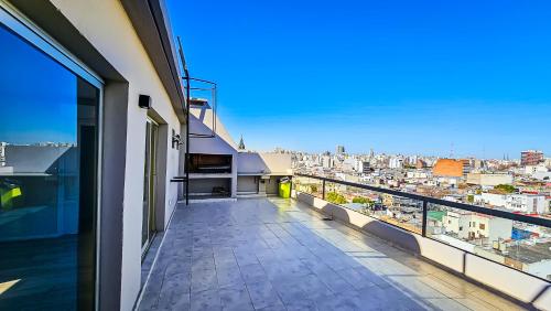 a balcony with a view of a city at Movistar Arena "Rincón de ensueño" Palermo in Buenos Aires
