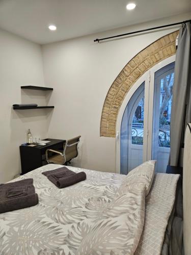 Postel nebo postele na pokoji v ubytování Habitación céntrica de Lujo Gv 1