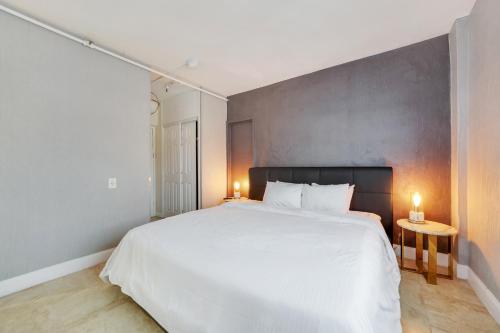 Ένα ή περισσότερα κρεβάτια σε δωμάτιο στο Starlite Hotel