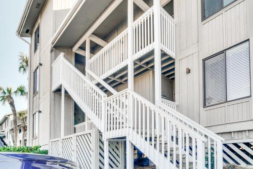 a white staircase on the side of a building at St Helena Island Vacation Rental Walk to Beach! in Oceanmarsh Subdivision