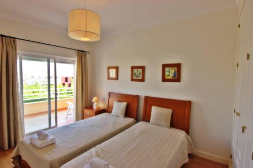 Postel nebo postele na pokoji v ubytování ViaMar Apartment