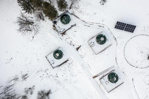 an aerial view of a building in the snow at BUNNY GLAMP in Korbielów