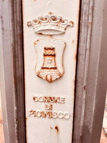 a door with a sign that says comine de france at Torretta Margiotta in Picinisco