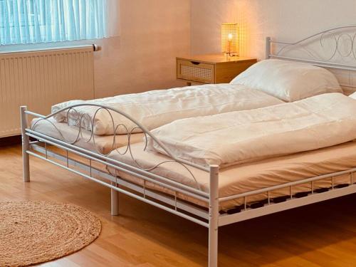Voodi või voodid majutusasutuse Auszeit im Grünen nahe der Heide toas