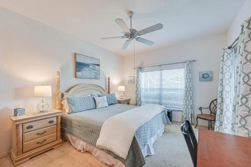 a bedroom with a bed and a ceiling fan at Naples Vacation Rental Home with Heated Private Pool in Naples