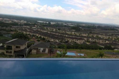 a view from a swimming pool in a house at Ecusuites Penthouse Vía Costa Ceibos Puerto Azul in Guayaquil