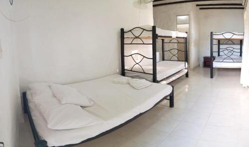 Ένα ή περισσότερα κρεβάτια σε δωμάτιο στο Centro Recreacional Villa Clarita