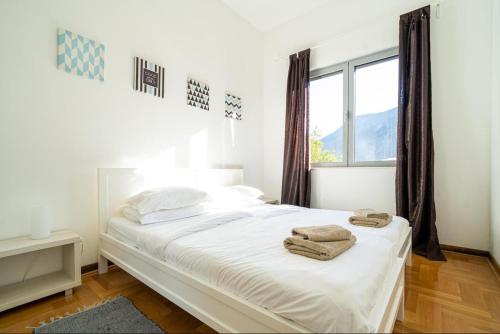 Postel nebo postele na pokoji v ubytování Lavender Bay C04