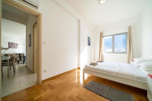 Ένα ή περισσότερα κρεβάτια σε δωμάτιο στο Lavender Bay C04