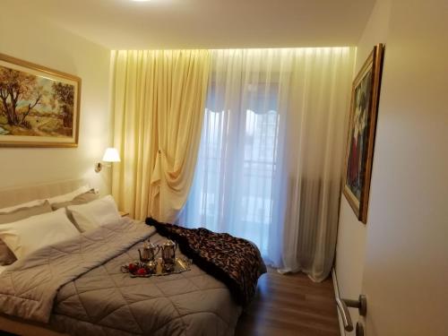 Postel nebo postele na pokoji v ubytování Central Apartament on Clock Square D2