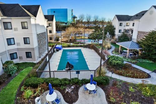 an aerial view of a backyard with a swimming pool at Staybridge Suites Columbia - Baltimore by IHG in Columbia