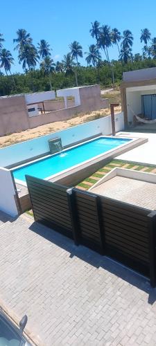 Πισίνα στο ή κοντά στο Casa beach Japaratinga
