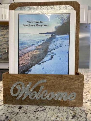 a picture of a beach in a wooden box at Chesapeake Holiday House in Port Republic