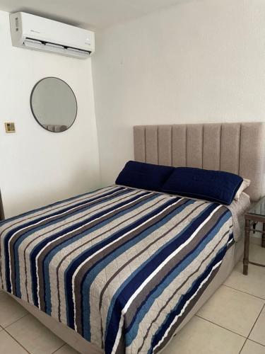Postel nebo postele na pokoji v ubytování Posada San Carlos 316