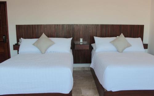 Postel nebo postele na pokoji v ubytování Hotel Zócalo Chilpancingo