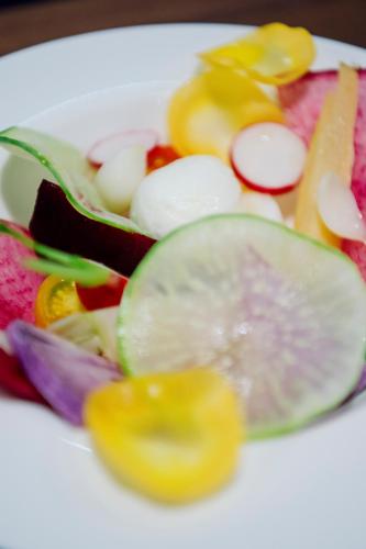 a plate of vegetables on a white plate at MUWA NISEKO in Kutchan