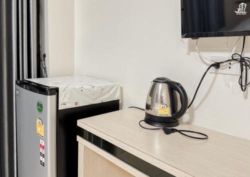 Kuchyň nebo kuchyňský kout v ubytování Jacky Chan Hotel