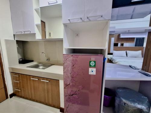 Una cocina o cocineta en Apartemen Vida View Makassar by drAnca