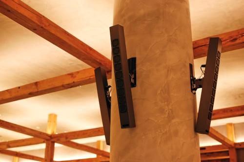 a pair of speakers hanging from a ceiling at NOHGA HOTEL KIYOMIZU KYOTO in Kyoto