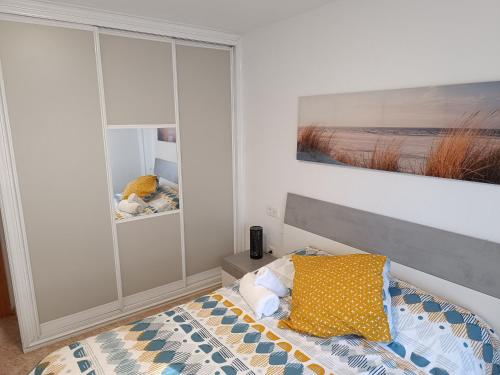 Posteľ alebo postele v izbe v ubytovaní Apartamento Velázquez