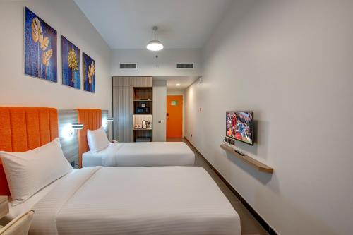 Postel nebo postele na pokoji v ubytování Wescott Hotel