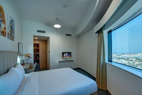 Postel nebo postele na pokoji v ubytování Wescott Hotel