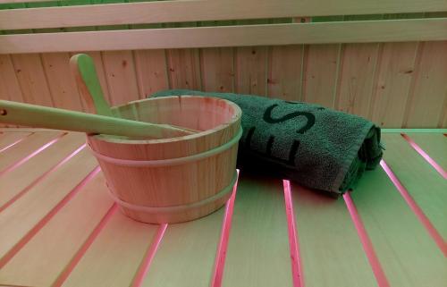 a bowling alley with a bucket and a ball at Eni-Time Mariazell mit Jakuzzi und Sauna in Mariazell