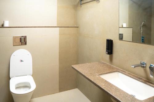 Koupelna v ubytování Hotel Ananda Kashi