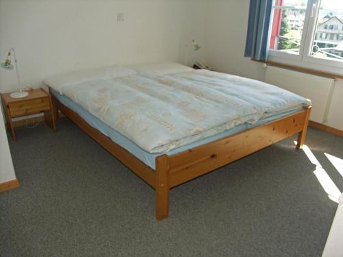 a bed in a room with a mattress on it at Hotel Restaurant Bahnhof in Schüpfen