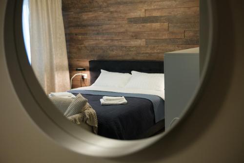 Giường trong phòng chung tại Konstanzer 95 - 1 camera, bucaterie, aer conditionat, masina de sopalat