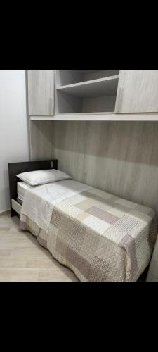 a bedroom with a bed in a room at KALGHEROS Luxury Rooms in Agrigento