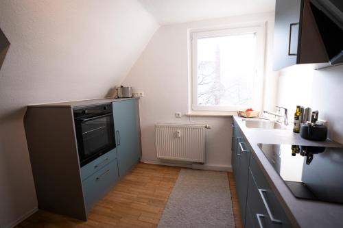 Dapur atau dapur kecil di Meerjungfrau - W14, zentral in Bahnhofsnähe, Küche