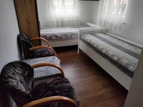 Postel nebo postele na pokoji v ubytování Gosciniec