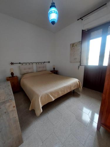 Postel nebo postele na pokoji v ubytování B&B Acchiappasogni