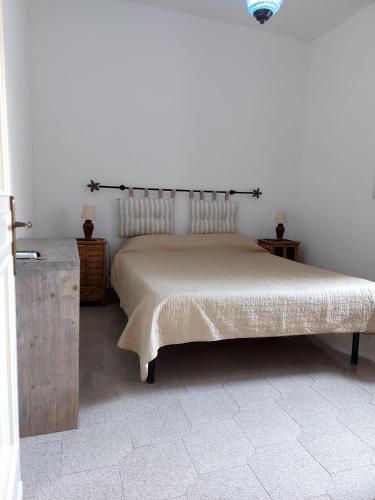 Postel nebo postele na pokoji v ubytování B&B Acchiappasogni