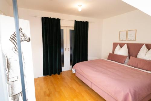Katil atau katil-katil dalam bilik di Seerose - W14, zentral in Bahnhofsnähe, Küche, 3 Schlafzimmer