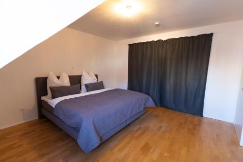 Katil atau katil-katil dalam bilik di Seerose - W14, zentral in Bahnhofsnähe, Küche, 3 Schlafzimmer