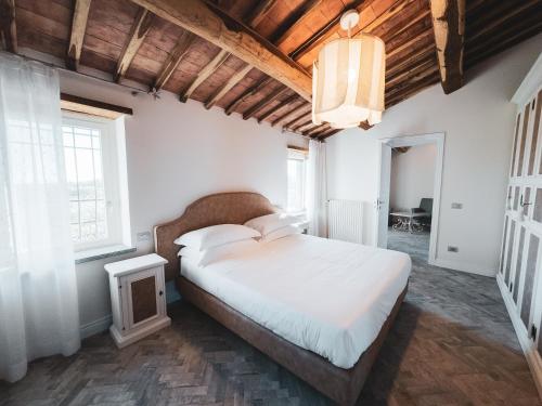Postel nebo postele na pokoji v ubytování Villa L'Uva e le Stelle