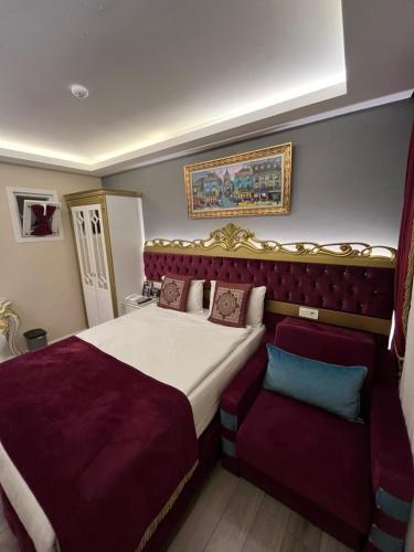 a hotel room with a bed and a couch at Constantinopolis Hotel in Istanbul