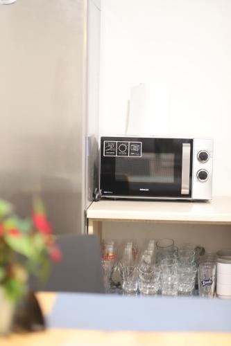 Kuchyň nebo kuchyňský kout v ubytování Forty40 Residence