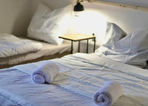 Postel nebo postele na pokoji v ubytování Forty40 Residence