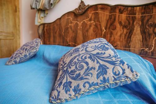 Ένα ή περισσότερα κρεβάτια σε δωμάτιο στο La Casa di Alice
