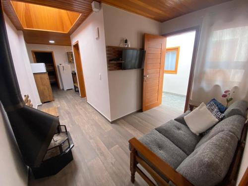 TV a/nebo společenská místnost v ubytování Hospedagem Casa Lorenzi 3