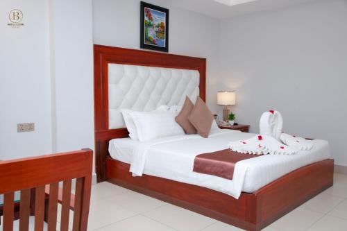 Cama o camas de una habitación en Ban Ban Hotel